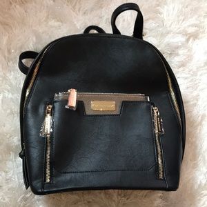 Woman Backpack with Metallic pouch